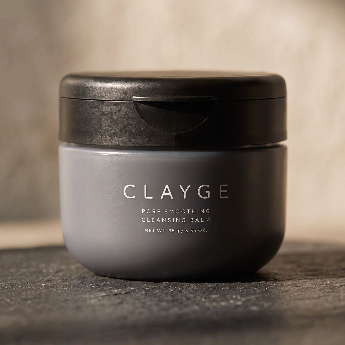 CLAYGE Pore Smoothing Cleansing Balm Black 95g — MACRO lifestyle view