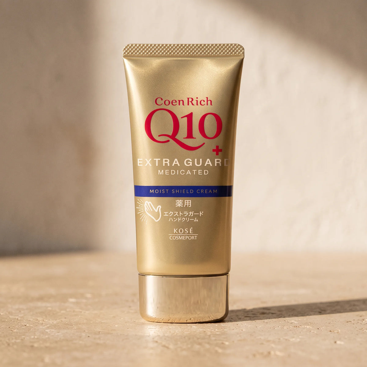 Kose Coenrich Q10 Extra Guard Hand Cream 80g — macro lifestyle view