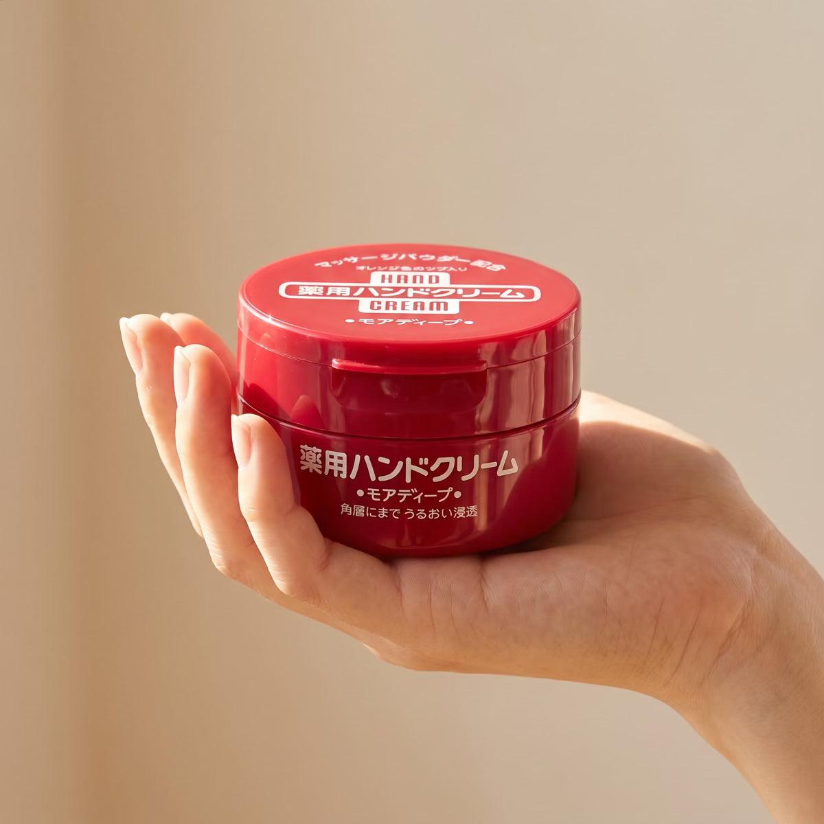 Shiseido Fine Today More Deep Medicated Hand Cream 100g - held in hand
