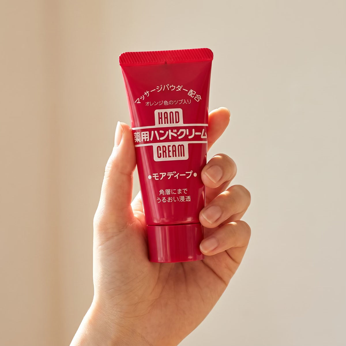Shiseido Fine Today More Deep Medicated Hand Cream 30g - held in hand