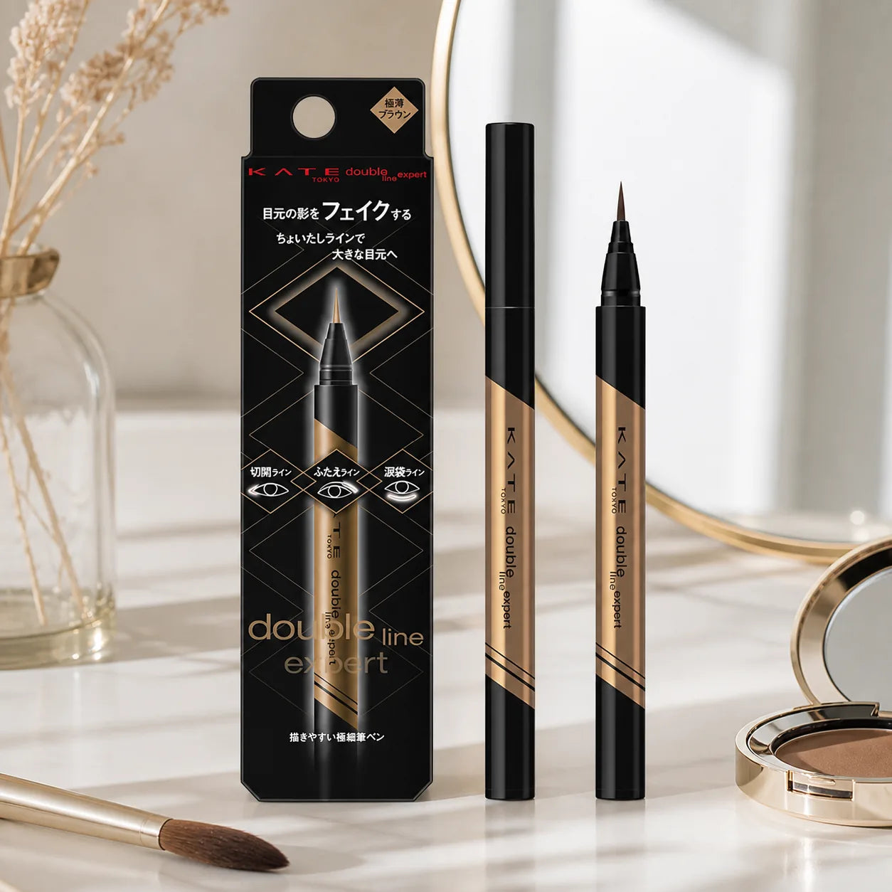 KATE Double Line Expert eyeliner arranged on a makeup vanity