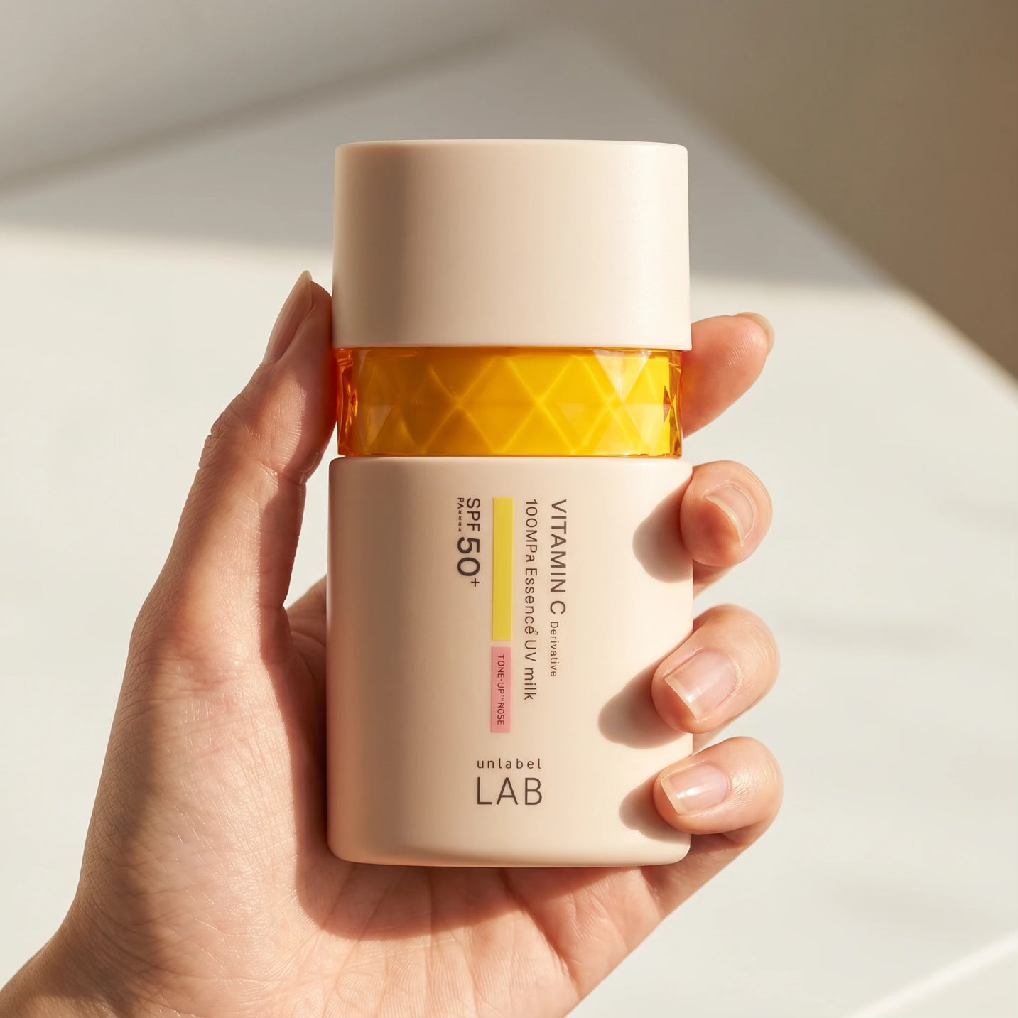 Unlabel LAB Vitamin C 100MPa Essence UV Milk (Tone Up Rose) SPF50+ PA++++ 50ml