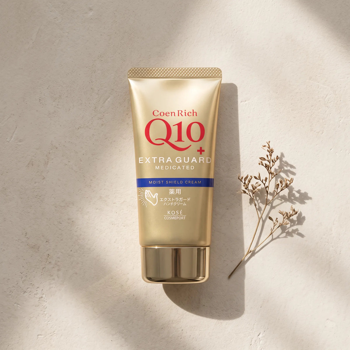 Kose Coenrich Q10 Extra Guard Hand Cream 80g — top angle lifestyle view
