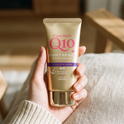 Kose Coenrich Q10 Night Renew Hand Cream 80g — on hand lifestyle view