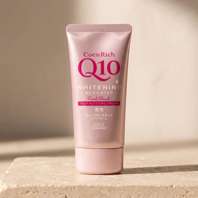 Kose Coenrich Q10 Whitening Fresh Peach Hand Cream 80g — macro lifestyle view