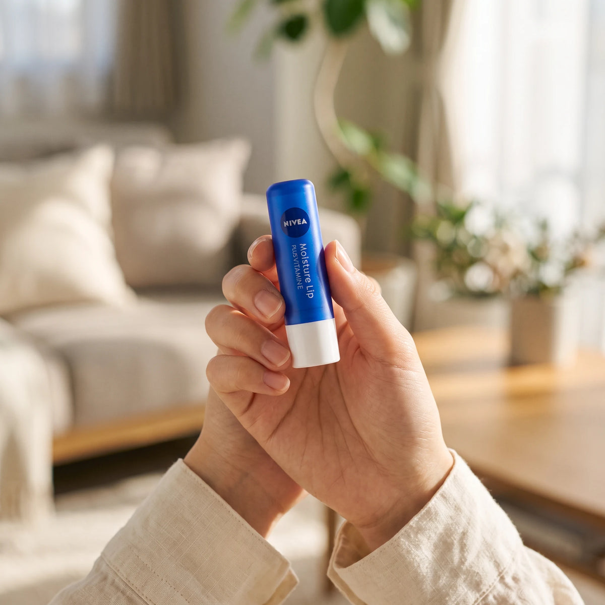 Nivea Japan Moisture Lip Plus Vitamin E 3.9g — on hand lifestyle view