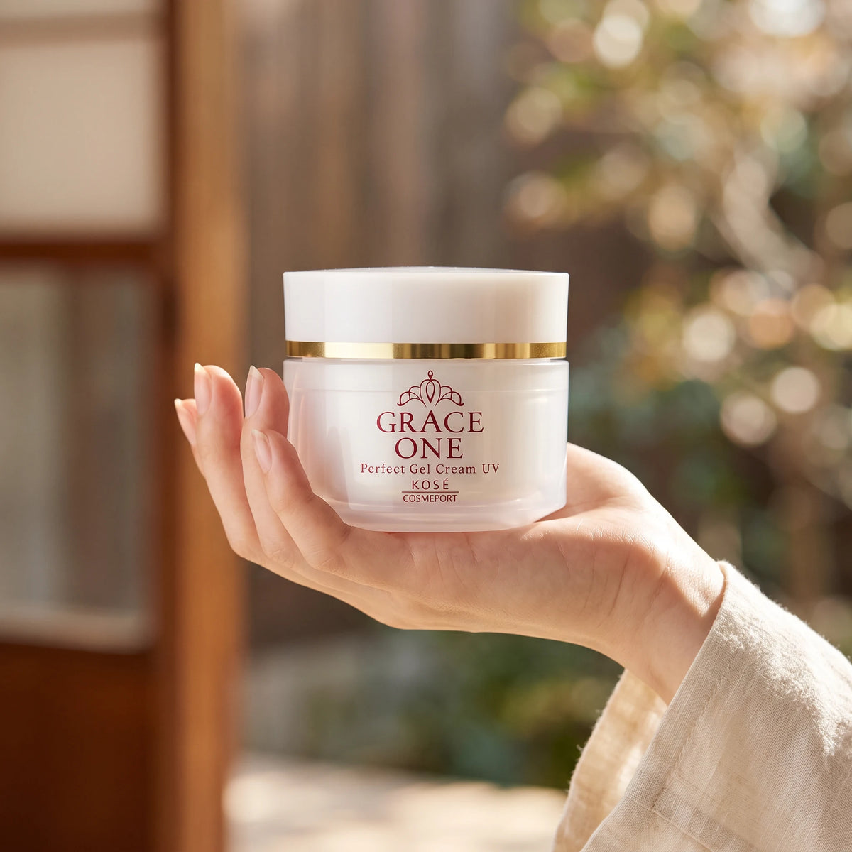 Kose Grace One Perfect Gel UV Cream SPF 50+ PA++++ 100g — on hand lifestyle view