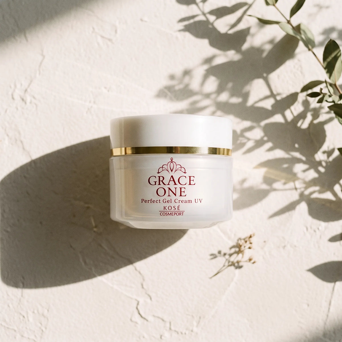 Kose Grace One Perfect Gel UV Cream SPF 50+ PA++++ 100g — top angle lifestyle view