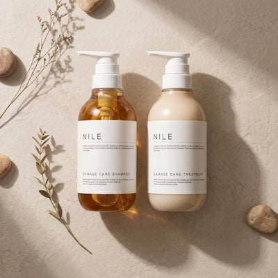 Nile Damage Care Shampoo & Treatment 400ml Each — top angle lifestyle view