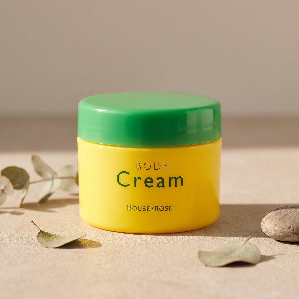 House Of Rose Oh!Baby Yuzu Lemon Body Cream 95g yellow jar on a warm neutral background