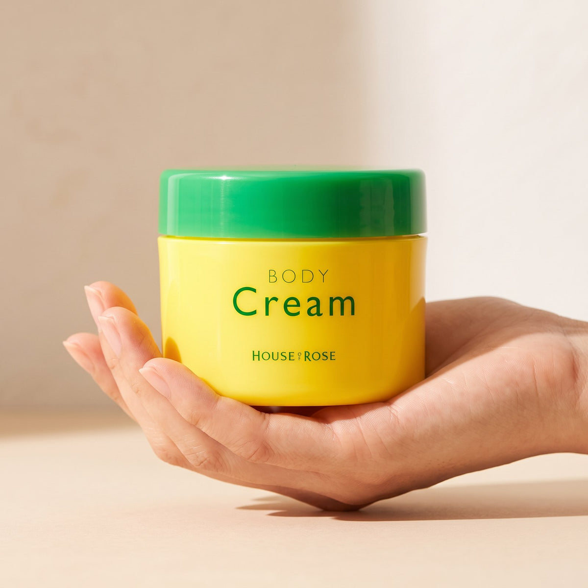 House Of Rose Oh!Baby Yuzu Lemon Body Cream 95g - product held in hand