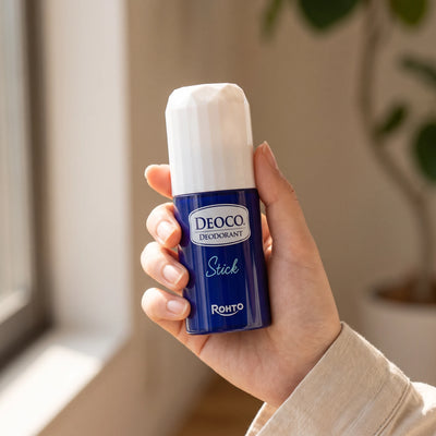DEOCO Medicated Deodorant Stick 13g — on hand lifestyle view