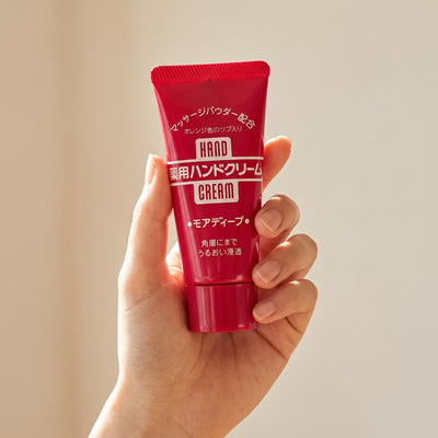 Shiseido Fine Today More Deep Medicated Hand Cream 30g - held in hand